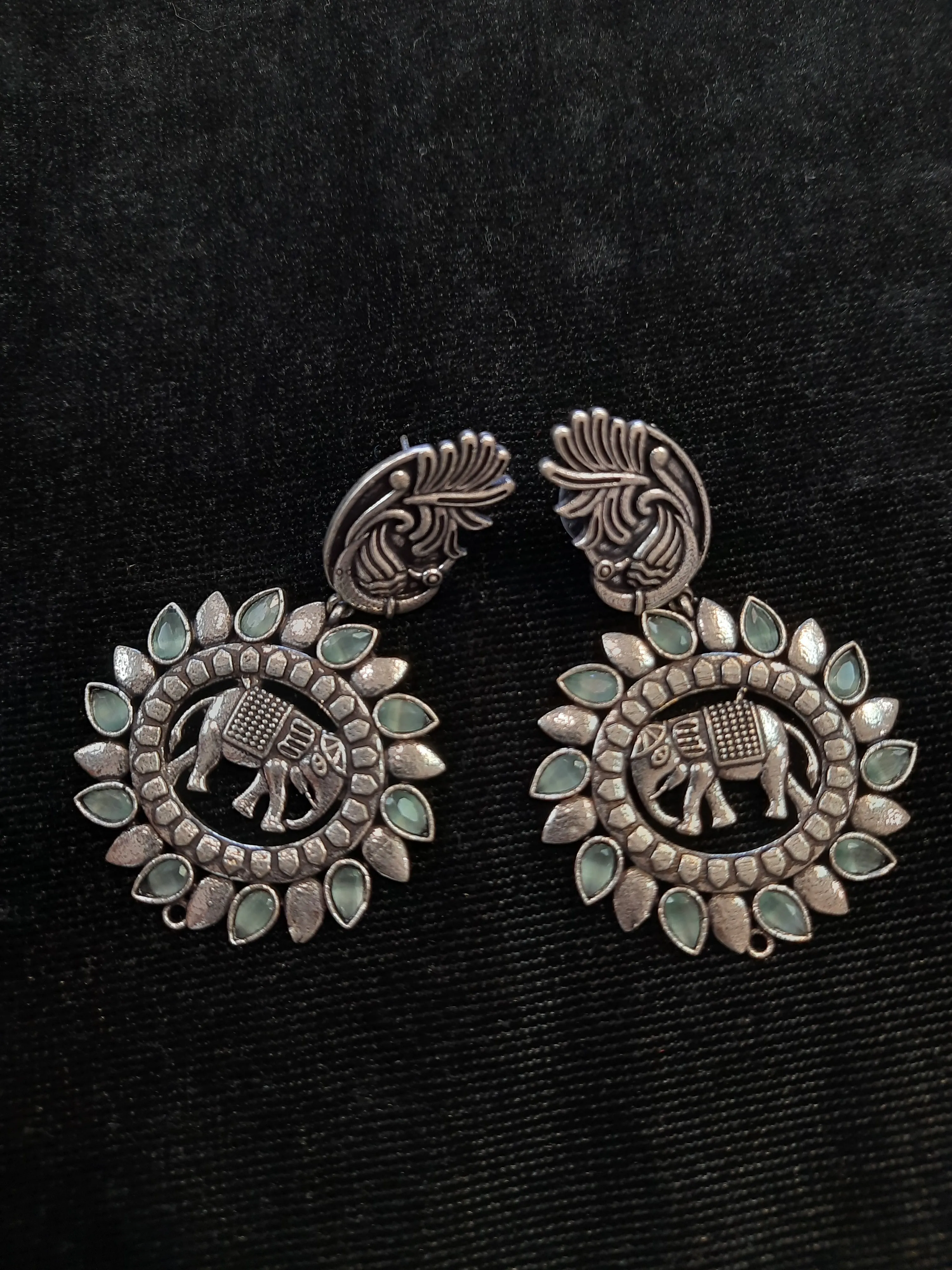 Attractive Light Blue And Silver Oxidized Round Earrings
For Women